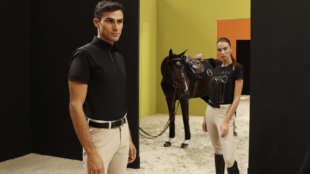 Two riders in competition wear inside an equestrian boutique