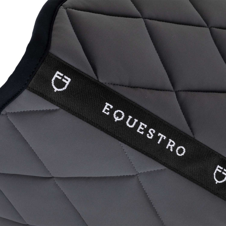 Jumping saddle pad with embroidered logo